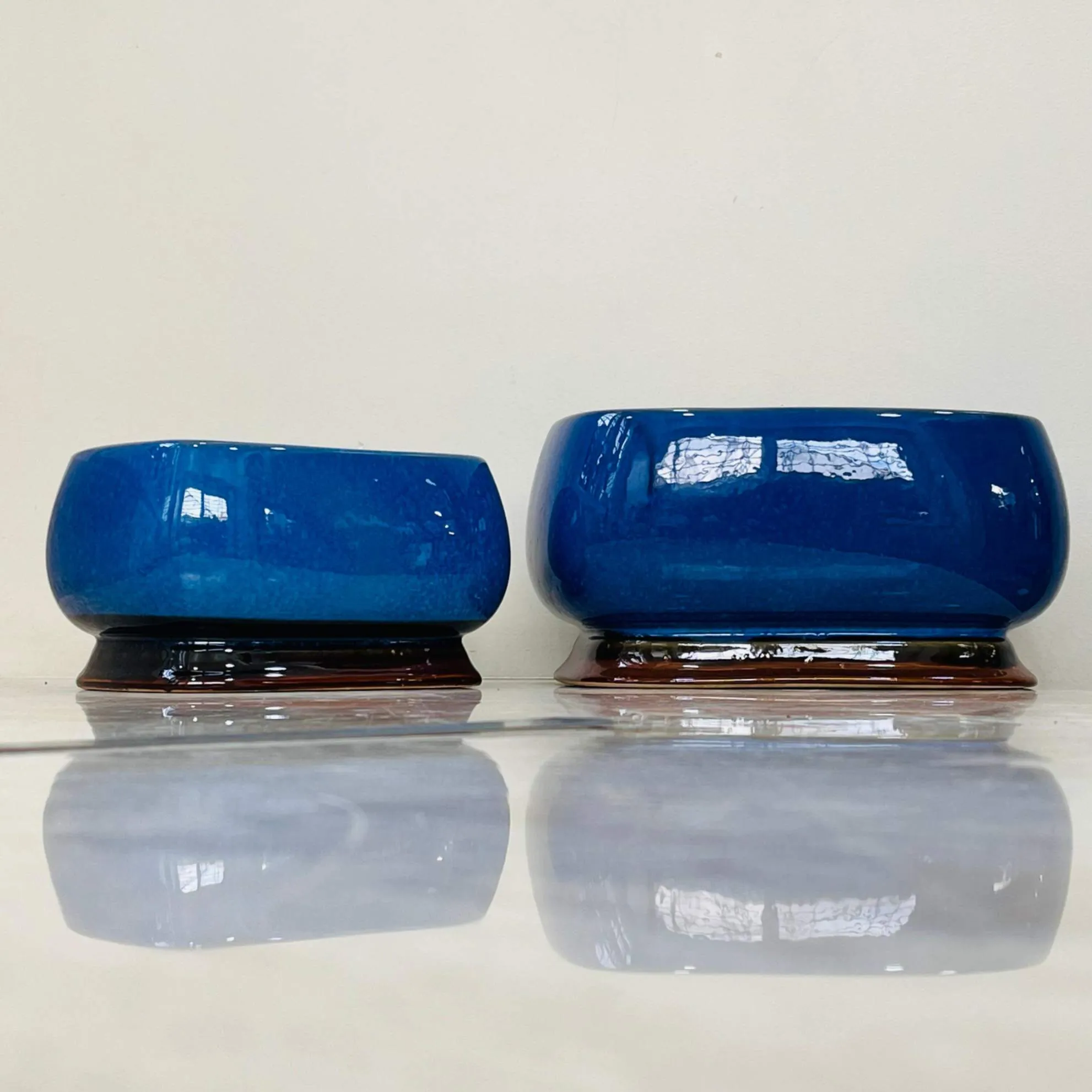 Glossy Blue Oval Ceramic Planter Set Of 2 with Brown Base
